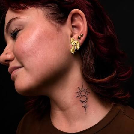 Minimal celestial neck tattoo by Supremacy Ink