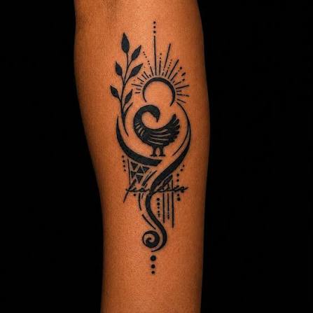 Symbolic blackwork arm tattoo by Supremacy Ink