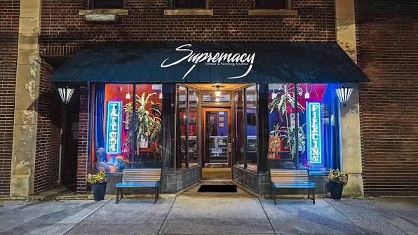 Supremacy Ink tattoo and piercing storefront on Lorain Avenue in Cleveland